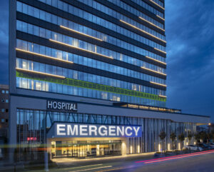 Healthcare facility with Emergency entrance, hinting at the urgency of some roofing projects.